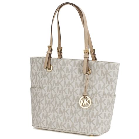 michael kors jet set large reversible tote pvc vanilla|Michael Kors large luggage sets.